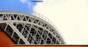 An exterior shot of the curved roof of Manchester Central, a railway station turned exhibition space.