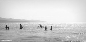 Visitors to Fuerteventura's Costa Calma enjoy a dip in the ocean.