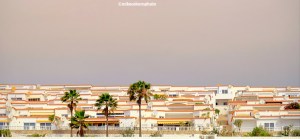 Tiers of whitewashed buildings in the resort of Pajara on Fuerteventura.
