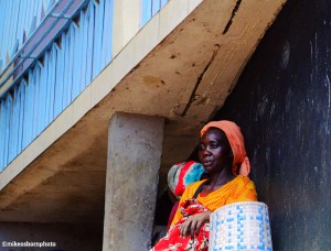 A Comoran woman taking a break near the busy marketplace of Mutsamudu in the Comoros Islands.