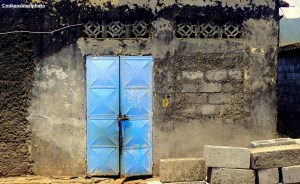 A bright blue door in a concrete dwelling at Domoni in the Comoros Islands,