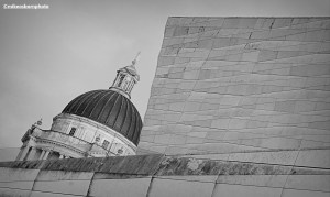 The dome of Liverpool's municipal building and concrete walls of the Museum of Liverpool.