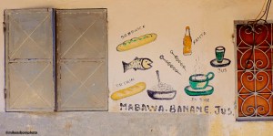 A painted wall display advertising a cafe in Domoni, Comoros Islands.