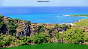 A green lagoon next to the blue ocean on the Comoros island of Ngazidja.