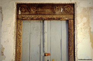 An old engraved wooden door in the backstreets of Moroni, the Comoros capital.