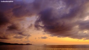 A dramatic sunset over the Comoros coastline at Itsandra.
