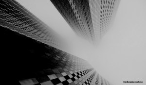 Towers at New Jackson in Manchester disappear into a thick carpet of fog.