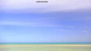 The blue sky and sea of a Tunisian beach on the island of Djerba,
