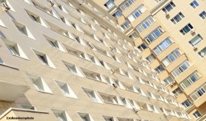 The convergence of two white apartment blocks in Astana, capital city of Kazakhstan.