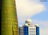 A gold high rise and mosque-style government building in Astana, capital of Kazakhstan.