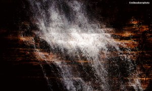 A mountain waterfall in full flow seen on a hike in the Central Asian republic of Kyrgyzstan.