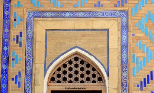 An elaborately decorated archway of the Khoja Ahmed Yasawi mausoleum in Turkistan, Kazakhstan.