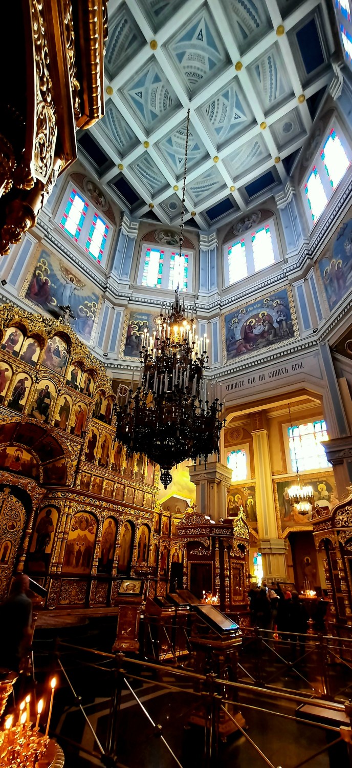 The opulent interior of the Orthodox Ascension Cathedral in Almaty, Kazakhstan.