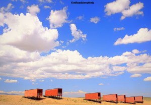 Accommodation capsules under the vast sky at Charyn Canyon in Kazakhstan.
