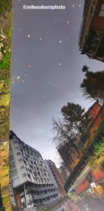 An inverse view of buildings reflecting in the Rochdale Canal in central Manchester.