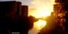 The buildings on either side of the Manchester Ship Canal catching the warm rays of a November afternoon.