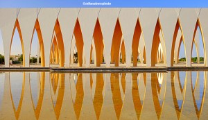 The Festival Plaza structure of El Gouna in Egypt reflecting in the water.