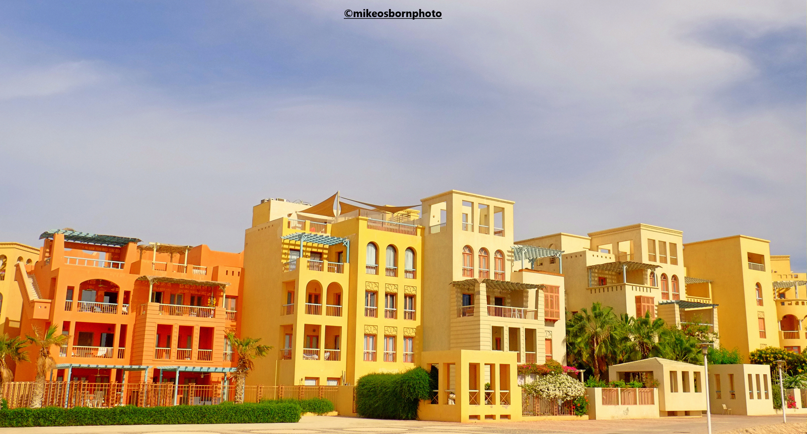 Villas painted in various pastel colours by the marina area of Egyptian Red Sea resort El Gouna.