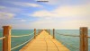 View of a wooden boardwalk jutting out into the Red Sea at Zaytouna Beach, El Gouna, Egypt.