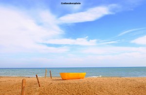 A yellow boat on a Red Sea beach at El Gouna in Egypt.